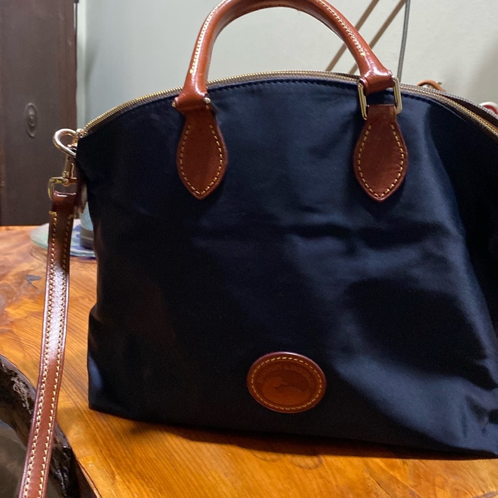 Dooney and Bourke , navy blue with hot pink inside